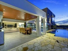 Sprawling Family Estate
Privately tucked away on a sensational block, this massive family home has everything a modern family needs and more. Open plan living and free flowing light filled spaces present the ideal design for everyday living. This whisper quiet location with views brings a whole new meaning to privacy.
At the very heart of the home is the chefs kitchen with Gaggenau appliances including self-cleaning oven, steam oven and coffee machine, stone bench tops, butler's pantry with sink and 2 fridges, plenty of storage and a breakfast bar that flows seamlessly through to the dining and living areas. Leading out through bi fold doors from main living space is the expansive outdoor entertainment area, highlighting 2 fridges and a sink, perfect for every season, taking in the spectacular view over the resort style, negative edge solar heated pool, spa and Balinese inspired setting and swim up bar.
The home holds five bedrooms, all include built in robes and the main bedroom includes a luxury ensuite, walk-in robe and private balcony overlooking the entire grounds. All bedrooms enjoy the views of the estate and its leafy surrounds. A well-appointed main bathroom also services the bedrooms on the upper level.
The entire home is air conditioned throughout and incorporates an intercom system for added security. The family has catered for the kids with a play area featuring bubbles and squirts. Outside the grounds are complete with chicken coop, dog area with gate enclosures and a citrus garden. With 9 car under cover accommodation and another three bay shed, incorporating high boat/caravan port, this private family home is ready for you to simply move in and enjoy.
This captivating residence is just moments from Westfield Carindale, close to local shops, elite schools, and enjoys easy access to main arterial roads. Relax and take in the views at your new Place.