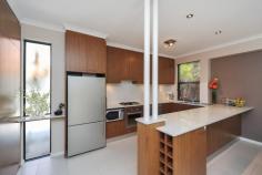 1/217 Coode St , COMO WA Light, modern home in close proximity to the city and CBD. Situated in a great location, this inviting street front townhouse is sure to impress. A secure entry gate and formal entry lead you into a spacious well maintained home. The open plan kitchen overlooks the dining and family/lounge room both with sliding doors onto the tranquil entertaining area. Stainless steel appliances, Caesar Stone bench tops, breakfast bar add a touch of class to the modern kitchen. Sliding glass doors allow easy access to a big outdoor undercover pergola with retractable awning � ideal for all year round entertaining. Also on the ground floor, there is a study/4th bedroom, powder room, laundry and direct access from the double garage into the residence. Upstairs, there is another living area, complimented by a Juliet balcony. The main bedroom is spacious and incorporates an ensuite and large walk in robe. The second and third bedrooms have double built in robes and are serviced by the family bathroom. This is a low maintenance residence you would be proud to own. Be quick to view! KEY SELLING FEATURES � Spacious double size bedrooms � all with robes � Master with ensuite � double vanity and walk in robes � 2 Living areas � Chef�s kitchen with Caesar Stone bench tops, breakfast bar � Open plan dining room � Study/4th bedroom � Powder room � Family bathroom � with bath � Reverse cycle air conditioning � Ducted Vacuum � Double garage with remote controlled door � Direct access into the home from garage � Lovely grassed front yard with secure entry gate � North facing undercover entertaining area with retractable awning and water feature � Security screens to lower level � Security system � Alarm � No common walls � Pets Allowed � Close to state and private schools, shops, transport, river and CBD Rates / Costs Water Rates:$1025.05 p/aCouncil Rates:$2218.25 p/aTotal Fees:$3243.30 p/a