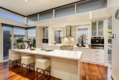 Like-new modern seaside luxury with spectacular views of Mornington and Mills beaches, both barely a stone-throw away! Enjoy a voluminous elevated open-plan living/dining adorn with sunlit architectural light shelves, master bedroom suite with a huge timber deck that overlooks the breathtaking Mornington Beach, first-class Caesar stone kitchen that opens to a rear timber deck with a gorgeous Mills Beach backdrop, two deluxe bedrooms downstairs plus home office/library, rumpus room with a beverage bar, wine storage and the indispensible double remote garage. Spoil yourself with pristine manicured gardens, the unmistakable Canary Island palm tree and a resort-style timber pavilion - all only moments away moments away from fantastic amenities that make Mornington Peninsula so famous.
-Proudly custom-built by multi-award winning Englehart Homes
-A stone-throw to both Mornington Beach and Mills Beach
-Panoramic water views
-Like-new (one owner) & exceptionally low maintenance
-Bonus home-office/library at front
-Elevated huge open-plan living and dining with stylish architectural light shelves
-Master suite opens directly to a large front deck with breathtaking Mornington Beach view
-Kitchen is directly connected to the rear deck - perfect for entertaining against the gorgeous Mills Beach backdrop
-Rumpus room with a fully equipped bar, wine storage and home entertainment, can also be entirely opened to the rear courtyard
-Luxurious spotted gum flooring throughout
-Ultra-modern open staircase with brushed steel railing
-First-class kitchen with Caesar Stone top, walk-in pantry, hidden fridge alcove, Ilve and Miele appliances plus built-in espresso machine
-Meticulously groomed gardens with a spectacular Canary Island palm tree
-Entertainer's outdoor patio and resort-style garden pavilion
-High-quality built-in storage solutions throughout
-Separate laundry with dog-ready door
-Multi-zone climate control (generous 3-phase/25 kilowatt power)
-Gas powered open-fireplace
-Rainwater tank
-Remote controlled double garage with storage