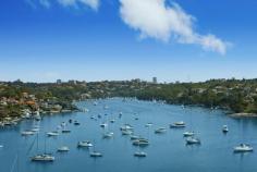 32 Bay Street, Mosman NSW This luxuriously renovated family home boasts panoramic views across Quakers Hat Bay and Middle Harbour and offers a private whisper quiet lifestyle. This property is a rare combination of a family friendly layout, superb entertaining possibilities and world class views. Features include: Stylish renovated interiors, large 915 m2 block, landscaped front & rear gardens Vast living areas flowing to covered entertaining with stunning back drop Child friendly garden/lawn and swimming pool all visible from kitchen & living Gourmet integrated Caesar stone kitchen with 2 bosch ovens Superb master suite with luxurious ensuite, walk in robes, stunning views Hardwood and Travertine floors, stained glass, LED downlights, Ducted air-conditioning Double automatic garage with internal access, additional storage, alarm Moments to shops, schools, buses and scenic bayside reserves A fabulous home for families of all ages with a spectacular middle harbour backdrop. A must see.