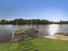 RARE MAIN RIVER ESTATE - An Entertainers Paradise
For the past 18 years has been home to one of Australia's most successful sportsmen.
The main home is Ranch style with 5 large bedrooms, 5 bathrooms, study, gourmet kitchen, large living rooms and double garage. Additional to this, there is a separate guest area including kitchen, lounge, bathroom, large office, work room and 3rd garage.
Bring your friends to the unique freestanding fully equipped sports bar to watch sport with beer on tap. The pool area has its own Bali Hut with full kitchen including Pizza Oven. At your own jetty enjoy the undercover BBQ area.
This truly amazing property has all the benefits of a resort in your own backyard only 10 minutes to the beach and all the best the Gold Coast has to offer.
A private estate on Main River where properties rarely become available this estate has everything an entertainer could want.
Countless more features for the discerning buyer of this property to enjoy! This sensational property has to be seen to be believed. Don't miss this opportunity.
View Sold Properties for this Location
View Auction Results
General Features
Property Type:House
Bedrooms:5
Bathrooms:5
Indoor Features
Ensuite:4
Ducted Heating
Ducted Cooling
Air Conditioning