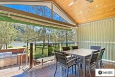 2868 River Road, Wisemans Ferry NSW For Sale - Villas From $485,000 bed 2 bath 1 car 2 Ko-veda Holiday Park Estate Ltd. is the only brand new facility of its kind in Australia, based on the American idea "Gated Facility", assuring excellent security and luxurious surroundings for its occupants. It`s an upmarket absolute waterfront resort catering only for the individual Villa owners and their families and friends. No public access whatsoever. The Park is situated in very pristine settings on the banks of the Hawkesbury River within 1 hour pleasant drive from Sydney CBD on non-congested roads, even in peak holiday periods, and when you get there, you get the feeling you`re completely separated from the rest of the world, very protected from all the elements situated between mountain sides on both sides of the 500 metre wide River, with Pitt Water & Windsor 1 hour away in opposite directions by boat. The Park consists of 42 immaculately kept acres, 1000m water frontage with established Jetties & Pontoons. Every Villa owner has absolute water frontage within 20m to the waters edge, exclusive private beach and boat mooring directly in front. The Park is also an attractive destination for Cruiser owners. We offer year round all inclusive cruiser mooring or dry storage on land, we will actually custom build an on-site trailer for your boat up to 40` in length, a very attractive alternative for the discerning Cruiser owner to store this valuable asset on land for at least half the year may be more and only launch it for peak periods, allowing for hull maintenance, etc.. Experienced mechanics, boat builders, trimmers, etc.is also available at any given time. New Villa owners can choose their own desired interior layout, colour schemes, choice of appliances, tiles, etc.. The Villas have a double garage attached to them for the storing of Powerboats, jet skis and every conceivable gadget used for water activities of any kind. For more information visit website www.koveda.com.au or contact Travis Reeve on 0414 347 713