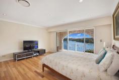 32 Bay Street, Mosman NSW This luxuriously renovated family home boasts panoramic views across Quakers Hat Bay and Middle Harbour and offers a private whisper quiet lifestyle. This property is a rare combination of a family friendly layout, superb entertaining possibilities and world class views. Features include: Stylish renovated interiors, large 915 m2 block, landscaped front & rear gardens Vast living areas flowing to covered entertaining with stunning back drop Child friendly garden/lawn and swimming pool all visible from kitchen & living Gourmet integrated Caesar stone kitchen with 2 bosch ovens Superb master suite with luxurious ensuite, walk in robes, stunning views Hardwood and Travertine floors, stained glass, LED downlights, Ducted air-conditioning Double automatic garage with internal access, additional storage, alarm Moments to shops, schools, buses and scenic bayside reserves A fabulous home for families of all ages with a spectacular middle harbour backdrop. A must see.