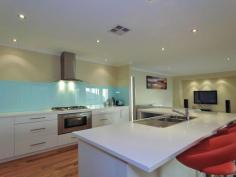 6 BAFILE LANE BEELIAR WA From $609,000 ANOTHER "UNDER OFFER" BY BRENDAN TADDEO "UNDER OFFER" Situated on an elevated 559sqm block (appx) with a HUGE 19.3m frontage this superbly presented home has it all. This property comprises of 4 bedrooms 2 bathrooms, separate home office and separate home theatre and has many upgraded features making this home a sort after piece of real estate. Featuring 4 double sized bedrooms, 2 luxurious bathrooms, spectacular open plan living areas and sensational outdoor entertaining area makes this home perfect for the growing family or entertainer. Built to impress all the electrical work has been upgraded to feature down lighting and dimmer switches. A chef’s gourmet kitchen positioned at the heart of the design with 900mm stainless steel appliances and glass splash backs with soft closers to all drawers and doors. Premium wood flooring throughout and heavy duty quality carpets, a double sized master suite walk in robe that has been custom designed to accommodate every woman’s needs, side access for the caravan or trailer and a large alfresco under the main roof with quality timber decking off the family and meals room. Situated amongst quality built homes and within a short stroll to local parks and minutes from Coogee beach and Fremantle makes this home all the more attractive and a great investment. More FeatureBathrooms2Bedrooms4DiningFamilyGas ConnectedGas PassesInsulationKitchenLoungeOutdoor EntertainingSewer ConnectedSewer PassesStoreys1StudyWater Closets2 For more information or an onsite inspection call Brendan Taddeo today! Contact Agent Brendan Taddeo M: 0400 021 927 SEND EMAIL