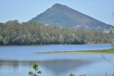 Bimbadeen means place of waterbirds - a waterfront acres sanctuary with 300 degree lake views, fishing, boating, sailing, flying??? Frontage to beautiful Lake Macdonald overlooking Noosa's botanical gardens. Private driveway is boarded by water on either side, with exotic wildlife and magnificent views to Mt Cooroy & Tinbeerwah. The perfect combination of being only 5 minutes from Cooroy and 15 minutes to Noosa, with town water, sewer and peace and tranquility. Sprawling brick residence with raked ceilings, french oak floors, gourmet kitchen, gas & induction cooking and ducted air conditioning. Solid timber doors & windows throughout. 3 separate living areas, wide entertaining patios, 4 car garage and boat store/cellar under the home.
500m Bitumen airstrip, fully insulated 2 plane hangar with workshop, separate machinery shed and van port.
Stroll the park like acreage on this resort style sanctuary tailored for relaxation. Host a tennis party on your own flood lit tennis court. This property is your opportunity to live the dream, own or operate an aircraft, also ideal for car or boat enthusiast with 2 large quality sheds and 3 phase power.18.29 acres/7.4 hectares. For further details or inspection please contact our office. rh06506
Bimbadeen - 18.29 acressealed airstrip2km Lake Frontplane hangar and shedstotally private