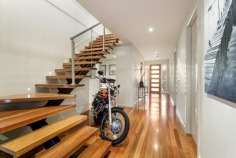 Like-new modern seaside luxury with spectacular views of Mornington and Mills beaches, both barely a stone-throw away! Enjoy a voluminous elevated open-plan living/dining adorn with sunlit architectural light shelves, master bedroom suite with a huge timber deck that overlooks the breathtaking Mornington Beach, first-class Caesar stone kitchen that opens to a rear timber deck with a gorgeous Mills Beach backdrop, two deluxe bedrooms downstairs plus home office/library, rumpus room with a beverage bar, wine storage and the indispensible double remote garage. Spoil yourself with pristine manicured gardens, the unmistakable Canary Island palm tree and a resort-style timber pavilion - all only moments away moments away from fantastic amenities that make Mornington Peninsula so famous.
-Proudly custom-built by multi-award winning Englehart Homes
-A stone-throw to both Mornington Beach and Mills Beach
-Panoramic water views
-Like-new (one owner) & exceptionally low maintenance
-Bonus home-office/library at front
-Elevated huge open-plan living and dining with stylish architectural light shelves
-Master suite opens directly to a large front deck with breathtaking Mornington Beach view
-Kitchen is directly connected to the rear deck - perfect for entertaining against the gorgeous Mills Beach backdrop
-Rumpus room with a fully equipped bar, wine storage and home entertainment, can also be entirely opened to the rear courtyard
-Luxurious spotted gum flooring throughout
-Ultra-modern open staircase with brushed steel railing
-First-class kitchen with Caesar Stone top, walk-in pantry, hidden fridge alcove, Ilve and Miele appliances plus built-in espresso machine
-Meticulously groomed gardens with a spectacular Canary Island palm tree
-Entertainer's outdoor patio and resort-style garden pavilion
-High-quality built-in storage solutions throughout
-Separate laundry with dog-ready door
-Multi-zone climate control (generous 3-phase/25 kilowatt power)
-Gas powered open-fireplace
-Rainwater tank
-Remote controlled double garage with storage