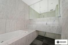 Unit 1501/507 Wattle Street, Sydney NSW For Sale - $3,300,000 3 4 4 For the first time offered since completion, Vanguarde is happy to present to you this spectacular brand new three bedroom penthouse, which is ideal for the modern family or foreign purchaser. Commanding the top 2 levels, this impressive residence offers a huge roof top terrace with uninterrupted 180 degree north, views of Sydney. Spanning from the west right around to the east, this aspect incorporates stunning city skyline and Anzac Bridge views. Accommodation comprises of 3 generous bedrooms, all with full ensuites including spa bath, and built in robes. This residence offers a total of 545sqm on title. The huge rooftop terrace includes a full outdoor kitchen with BBQ plus a complete guest bathroom. With direct lift access from the ground, making it perfect for entertaining guests! Features include only the highest quality finishes throughout, including marble stone and Australian hardwood timber flooring, LED lights and double glazed floor to ceiling glass, allowing you to take in the expansive views. The designer kitchen comes complete with White Caesar stone bench tops, stainless steel Smeg appliances including built in coffee machine and plate warmer, soft close drawers and a built in double door fridge. The residence provides ducted reverse cycle air-conditioning, spacious 4 car lock up garage with direct lift access plus extra storage, an internal laundry and a self controlled video security system. With the lowest strata levies in Sydney for a property of this size, and the possibility to extend space and add value, the opportunities in purchasing this property are endless. This is truly a unique property and is must see for anyone looking at purchasing their perfect city home! Quarterly Rates Strata: $805 per quarter approx Water: $168 per quarter approx Council: $225 per quarter approx For more information contact Travis Reeve on 0414 347 713 or travis@vanguarde.com.au or Darren Smith on 0412 418 415