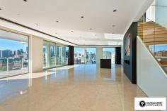 Unit 1501/507 Wattle Street, Sydney NSW For Sale - $3,300,000 3 4 4 For the first time offered since completion, Vanguarde is happy to present to you this spectacular brand new three bedroom penthouse, which is ideal for the modern family or foreign purchaser. Commanding the top 2 levels, this impressive residence offers a huge roof top terrace with uninterrupted 180 degree north, views of Sydney. Spanning from the west right around to the east, this aspect incorporates stunning city skyline and Anzac Bridge views. Accommodation comprises of 3 generous bedrooms, all with full ensuites including spa bath, and built in robes. This residence offers a total of 545sqm on title. The huge rooftop terrace includes a full outdoor kitchen with BBQ plus a complete guest bathroom. With direct lift access from the ground, making it perfect for entertaining guests! Features include only the highest quality finishes throughout, including marble stone and Australian hardwood timber flooring, LED lights and double glazed floor to ceiling glass, allowing you to take in the expansive views. The designer kitchen comes complete with White Caesar stone bench tops, stainless steel Smeg appliances including built in coffee machine and plate warmer, soft close drawers and a built in double door fridge. The residence provides ducted reverse cycle air-conditioning, spacious 4 car lock up garage with direct lift access plus extra storage, an internal laundry and a self controlled video security system. With the lowest strata levies in Sydney for a property of this size, and the possibility to extend space and add value, the opportunities in purchasing this property are endless. This is truly a unique property and is must see for anyone looking at purchasing their perfect city home! Quarterly Rates Strata: $805 per quarter approx Water: $168 per quarter approx Council: $225 per quarter approx For more information contact Travis Reeve on 0414 347 713 or travis@vanguarde.com.au or Darren Smith on 0412 418 415
