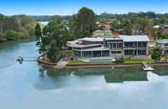 - Spectacular water views and picturesque ambiance with over 75 squares of living
- Immaculate residence with high ceilings and top quality fittings situated on a 964m2 allotment
- 5 bedrooms (3 ensuited bedrooms) including separate guest living zone
- 2 separate home offices and additional study
- State of the art entertainers kitchen which connects to stunning alfresco dining areas
- Built over 2 levels with an impressive 45.6m wide waterfront
- Luxury pool, private boat ramp with direct ocean access
- Functional floor plan, well designed for family or dual living
Land Size 964 sqm
Property Type House