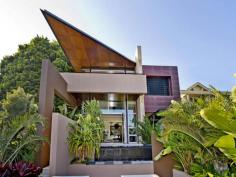 25 Hopetoun Avenue, Vaucluse NSW North Facing Architectural Family Home With Harbour Views Adding dramatic impact to a north facing elevated block, this award winning tropical resort style family oasis is an acclaimed architect's own home. Fusing harbour panoramas with soaring volumes & vast areas of glass, wood, sandstone, travertine & lush landscaping, the emphasis is on high tech architecture & sustainability, with carbon neutrality & self-sufficiency in energy & water use. Featuring large open plan interiors seamlessly connected to an extensive choice of poolside terraces, ponds, decks, balconies & garden areas, this substantial family home is an entertainer's dream, with the large rooftop view deck as a fabulous bonus. Opulent open plan living and dining areas Smeg marble gas island kitchen 5 beds, 4.5 baths, master w. ensuite & WIR Study/office or 5th bedroom, 4 car garage Fully appointed home cinema, wine cellar Heated bathroom floors, zoned air conditioning Stunning wet edge pool, Eco-smart fireplace View Sold Properties for this Location View Auction Results General Features Property Type: House Bedrooms: 5 Bathrooms: 4 Outdoor Features Garage Spaces: 4