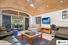 2868 River Road, Wisemans Ferry NSW For Sale - Villas From $485,000 bed 2 bath 1 car 2 Ko-veda Holiday Park Estate Ltd. is the only brand new facility of its kind in Australia, based on the American idea "Gated Facility", assuring excellent security and luxurious surroundings for its occupants. It`s an upmarket absolute waterfront resort catering only for the individual Villa owners and their families and friends. No public access whatsoever. The Park is situated in very pristine settings on the banks of the Hawkesbury River within 1 hour pleasant drive from Sydney CBD on non-congested roads, even in peak holiday periods, and when you get there, you get the feeling you`re completely separated from the rest of the world, very protected from all the elements situated between mountain sides on both sides of the 500 metre wide River, with Pitt Water & Windsor 1 hour away in opposite directions by boat. The Park consists of 42 immaculately kept acres, 1000m water frontage with established Jetties & Pontoons. Every Villa owner has absolute water frontage within 20m to the waters edge, exclusive private beach and boat mooring directly in front. The Park is also an attractive destination for Cruiser owners. We offer year round all inclusive cruiser mooring or dry storage on land, we will actually custom build an on-site trailer for your boat up to 40` in length, a very attractive alternative for the discerning Cruiser owner to store this valuable asset on land for at least half the year may be more and only launch it for peak periods, allowing for hull maintenance, etc.. Experienced mechanics, boat builders, trimmers, etc.is also available at any given time. New Villa owners can choose their own desired interior layout, colour schemes, choice of appliances, tiles, etc.. The Villas have a double garage attached to them for the storing of Powerboats, jet skis and every conceivable gadget used for water activities of any kind. For more information visit website www.koveda.com.au or contact Travis Reeve on 0414 347 713
