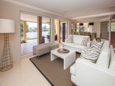 This prestigious estate is situated at the end of the highly respected Maryland Avenue. Situated in privacy behind grand electric gates and sand stone walls are two prime acres on two titles.
The architect has designed this home to maximize its North facing position with views to the East as well. This park like setting with mature trees is elevated 1.7 meters above adjoining land and has not been affected by major floods. This recently refurbished residence offers 1,000 square meters of opulent decor with the latest sinks, tubs and tap ware. Separate from the main house and situated near the entry gates is 2 bedroom guest house with its own complete kitchen, laundry, lounge and study. A large pontoon and wharf beside the river gives access to the Broadwater and out to the ocean from your back yard.
Features of this property:
7 Bedrooms, 6 bathrooms, 5 car garage with parking for upto 10 vehicles
Master bedroom includes parents retreat, twin dressing room, riverside balcony, and deluxe ensuite
Designer chefs kitchen with granite bench tops, 2 oven plus warming ovens, and walk in pantry
A Helipad has been approved for this estate.
Championship tennis court with flood lights and pavilion with kitchen, bath and shower.
10 meter pontoon, jet ski cradle, power and water supply
Infar-red security cameras with back to base alarms
Automatic emergency power generator
fully automated irrigation
Future sub- division potential - subject to council approval
Formal living area with open fireplace
Wine cellar
indoor/outdoor entertaining
In-ground swimming pool
in home theatre with elevated seating and soundproof walls
Games room
sizable laundry
Ducted air-conditioning
Landscaped gardens with mature trees and lush lawns, Horses are permitted on the property
Sweeping 200 degree river and skyline views
Less than 5 minutes drive to Royal Pines Golf Resort, Emerald lakes golf, Lakelands golf
8 min drive to Major Shopping Centres, Schools and Central Business district
This property is currently on two titles with an option to purchase the main house and guest house on 1 acre, or purchase 1 acre of riverfront land for offers over $2 million