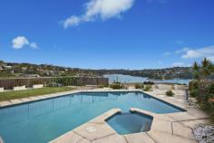 32 Bay Street, Mosman NSW This luxuriously renovated family home boasts panoramic views across Quakers Hat Bay and Middle Harbour and offers a private whisper quiet lifestyle. This property is a rare combination of a family friendly layout, superb entertaining possibilities and world class views. Features include: Stylish renovated interiors, large 915 m2 block, landscaped front & rear gardens Vast living areas flowing to covered entertaining with stunning back drop Child friendly garden/lawn and swimming pool all visible from kitchen & living Gourmet integrated Caesar stone kitchen with 2 bosch ovens Superb master suite with luxurious ensuite, walk in robes, stunning views Hardwood and Travertine floors, stained glass, LED downlights, Ducted air-conditioning Double automatic garage with internal access, additional storage, alarm Moments to shops, schools, buses and scenic bayside reserves A fabulous home for families of all ages with a spectacular middle harbour backdrop. A must see.
