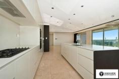 Unit 1501/507 Wattle Street, Sydney NSW For Sale - $3,300,000 3 4 4 For the first time offered since completion, Vanguarde is happy to present to you this spectacular brand new three bedroom penthouse, which is ideal for the modern family or foreign purchaser. Commanding the top 2 levels, this impressive residence offers a huge roof top terrace with uninterrupted 180 degree north, views of Sydney. Spanning from the west right around to the east, this aspect incorporates stunning city skyline and Anzac Bridge views. Accommodation comprises of 3 generous bedrooms, all with full ensuites including spa bath, and built in robes. This residence offers a total of 545sqm on title. The huge rooftop terrace includes a full outdoor kitchen with BBQ plus a complete guest bathroom. With direct lift access from the ground, making it perfect for entertaining guests! Features include only the highest quality finishes throughout, including marble stone and Australian hardwood timber flooring, LED lights and double glazed floor to ceiling glass, allowing you to take in the expansive views. The designer kitchen comes complete with White Caesar stone bench tops, stainless steel Smeg appliances including built in coffee machine and plate warmer, soft close drawers and a built in double door fridge. The residence provides ducted reverse cycle air-conditioning, spacious 4 car lock up garage with direct lift access plus extra storage, an internal laundry and a self controlled video security system. With the lowest strata levies in Sydney for a property of this size, and the possibility to extend space and add value, the opportunities in purchasing this property are endless. This is truly a unique property and is must see for anyone looking at purchasing their perfect city home! Quarterly Rates Strata: $805 per quarter approx Water: $168 per quarter approx Council: $225 per quarter approx For more information contact Travis Reeve on 0414 347 713 or travis@vanguarde.com.au or Darren Smith on 0412 418 415