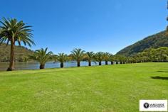 2868 River Road, Wisemans Ferry NSW For Sale - Villas From $485,000 bed 2 bath 1 car 2 Ko-veda Holiday Park Estate Ltd. is the only brand new facility of its kind in Australia, based on the American idea "Gated Facility", assuring excellent security and luxurious surroundings for its occupants. It`s an upmarket absolute waterfront resort catering only for the individual Villa owners and their families and friends. No public access whatsoever. The Park is situated in very pristine settings on the banks of the Hawkesbury River within 1 hour pleasant drive from Sydney CBD on non-congested roads, even in peak holiday periods, and when you get there, you get the feeling you`re completely separated from the rest of the world, very protected from all the elements situated between mountain sides on both sides of the 500 metre wide River, with Pitt Water & Windsor 1 hour away in opposite directions by boat. The Park consists of 42 immaculately kept acres, 1000m water frontage with established Jetties & Pontoons. Every Villa owner has absolute water frontage within 20m to the waters edge, exclusive private beach and boat mooring directly in front. The Park is also an attractive destination for Cruiser owners. We offer year round all inclusive cruiser mooring or dry storage on land, we will actually custom build an on-site trailer for your boat up to 40` in length, a very attractive alternative for the discerning Cruiser owner to store this valuable asset on land for at least half the year may be more and only launch it for peak periods, allowing for hull maintenance, etc.. Experienced mechanics, boat builders, trimmers, etc.is also available at any given time. New Villa owners can choose their own desired interior layout, colour schemes, choice of appliances, tiles, etc.. The Villas have a double garage attached to them for the storing of Powerboats, jet skis and every conceivable gadget used for water activities of any kind. For more information visit website www.koveda.com.au or contact Travis Reeve on 0414 347 713