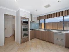 17 Seabird Bend, Jindalee WA There is a lot on offer with this delightful 5 bedroom, 2 bathroom Jindalee beachside home. Central to everything being only a short stroll to the beach, caf? and within a few minutes to the proposed Shopping Centre, new park n ride train and bus station (due completion 2014) , numerous schools and parks. These property features are endless?. ? Easy care front garden ? Liquid limestone driveway leading to an impressive elevation ? Double entry hallway with beautiful Italian porcelain tiles, high ceilings ? Large Master suite features fully fitted built in robes, ceiling fan ? Spa bath to en suite, his and hers vanities ? Further 4 good sized bedroom, guest bedroom overlooks the pool area ? Well planned out central open plan living, dining area, flat screen TV included ? Games room with large sliding doors, plenty of room for pool table ? Theatre room with modern feature lighting ? Fully decked Alfresco with quality caf? blinds, feature lighting, flat screen TV included ? Kitchen fully equipped, st/st double oven, hood, hob with feature glass splashback ? Easy access to laundry from kitchen and hallway ? Large study area with plenty of room for a home office ? Outside presents you with a gorgeous below ground pool, fully paved, water feature and newly fitted frameless glass fencing All the extras?. ? Quality fittings throughout ? Freshly painted ? Below ground Pool ? Smart wire with TV points in all main areas ? E-wire ? 2.5kw Solar panels ? Security doors ? Reverse cycle zoned aircon ? 320sqm of living (approx.) ? Built 2008 on 638sqm (approx.) block