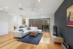 Glorious Modern Living
Boasting style and sun-drenched living enhanced by low-maintenance appeal, this well-appointed residence promises an easy lifestyle for young families or downsizers.
With polished timber floors and bathed in natural light, the open plan living-meals links to a contemporary kitchen with Caesarstone waterfall bench tops and stainless steel appliances, including a dishwasher.
There are two bedrooms on the entry level. One bedroom features a walk-in-robe that connects to the luxurious bathroom with corner spa, shower, toilet and vanity with stone bench top. A second bedroom also offers built-in-robes. The bright and airy main suite is upstairs and affords large built-in-robes with modern en-suite.
Further appointments include generous study nook, modern laundry, double garage with remote door and internal access, garden shed, water tank (for gardens), evaporative cooling, ducted heating, alarm, under-stairs storage, ceiling fans and stairwell lighting.
Glass sliding doors in the meals-living zone open to the timber deck delivering effortless everyday living as well as entertaining in the landscaped gardens.
The property is within walking distance to Bolton Street shops, Eltham High School, Montmorency South Primary, buses and parks.
Barry Plant Real Estate Eltham
Property Type: Townhouse
Property ID: 2628682
Melway Reference: 21 F5
Virtual Floorplan Link: Interactive Floorplan
Advanced Features: Alarm System
Built In Robes
Deck
Dishwasher
Ducted Heating
Ensuite
Evaporative Cooling
Floorboards
Indoor Spa
Outdoor Entertaining
Remote Garage
Shed
Water Tank