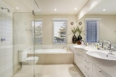 Like-new modern seaside luxury with spectacular views of Mornington and Mills beaches, both barely a stone-throw away! Enjoy a voluminous elevated open-plan living/dining adorn with sunlit architectural light shelves, master bedroom suite with a huge timber deck that overlooks the breathtaking Mornington Beach, first-class Caesar stone kitchen that opens to a rear timber deck with a gorgeous Mills Beach backdrop, two deluxe bedrooms downstairs plus home office/library, rumpus room with a beverage bar, wine storage and the indispensible double remote garage. Spoil yourself with pristine manicured gardens, the unmistakable Canary Island palm tree and a resort-style timber pavilion - all only moments away moments away from fantastic amenities that make Mornington Peninsula so famous.
-Proudly custom-built by multi-award winning Englehart Homes
-A stone-throw to both Mornington Beach and Mills Beach
-Panoramic water views
-Like-new (one owner) & exceptionally low maintenance
-Bonus home-office/library at front
-Elevated huge open-plan living and dining with stylish architectural light shelves
-Master suite opens directly to a large front deck with breathtaking Mornington Beach view
-Kitchen is directly connected to the rear deck - perfect for entertaining against the gorgeous Mills Beach backdrop
-Rumpus room with a fully equipped bar, wine storage and home entertainment, can also be entirely opened to the rear courtyard
-Luxurious spotted gum flooring throughout
-Ultra-modern open staircase with brushed steel railing
-First-class kitchen with Caesar Stone top, walk-in pantry, hidden fridge alcove, Ilve and Miele appliances plus built-in espresso machine
-Meticulously groomed gardens with a spectacular Canary Island palm tree
-Entertainer's outdoor patio and resort-style garden pavilion
-High-quality built-in storage solutions throughout
-Separate laundry with dog-ready door
-Multi-zone climate control (generous 3-phase/25 kilowatt power)
-Gas powered open-fireplace
-Rainwater tank
-Remote controlled double garage with storage
