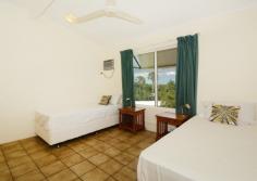 15/17 GERANIUM STREET, THE GARDENS NT
Close to Schools
Close to Shops
Close to Transport
Secure Parking
Separate Dining
This tranquil property overlooks the stunning Botanical Gardens and boasts ocean views over the treetops below and is only located minutes from the bustling Darwin CBD.
For an unbeatable view and an inner city location without the stress - you can't go past this treetop sanctuary.
- Gorgeous top floor apartment with botanical garden and ocean views
- Fresh sea breeze floods through the apartment keeping it cool year round
- Immaculately presented and perfectly maintained
- Open plan indoor / outdoor living and separate dining room
- Tiled flooring and air-conditioning throughout
- Centralised kitchen with breakfast bar, wrap around counters and overhead storage
- Two large bedrooms with BIR's, large windows and air-conditioning
- Spacious bathroom incorporates laundry facilities, separate toilet
- Rear facing balcony makes over the Botanical Gardens, amazing view
- Tropical well maintained complex with two lagoon style swimming pools
- Immaculate complex facilities and ample spare parking
- Minutes to the CBD, Mindil Beach Markets, East Point Reserve
- Ideal for the city worker or savvy investor as a great holiday rental unit
Sitting on the top floor of a well maintained complex that features not one, but two, lagoon style swimming pools surrounded by lush tropical gardens PLUS communal facilities like a BBQ area and washrooms - as an investor or a city worker, this is a little slice of paradise minutes from local amenities and Darwin attractions.
An open plan living room greets and draws you through to the rear facing balcony boasting those impressive treetop and ocean views. Open the twin sliding doors up to capture the sea breeze and sunsets and enjoy the serenity. Tiled flooring and air-conditioning throughout create and easy maintenance lifestyle as well.
Functional kitchen space with wrap around counters, over head storage plus breakfast bar and easy access to the dining room and the balcony if you are entertaining.
Each of the two bedrooms is oversized with built in robes, air-conditioning and tiled flooring plus large sliding windows that when opened up capture the sea breezes and natural light.
The bathroom is spacious and well designed to incorporate the laundry facilities as well, with separate for added convenience.
Minutes from the CBD, you can walk to the Mindil Beach Markets through the Botanical Gardens, to the Amphitheatre, or Darwin foreshore.
Council Rates: $1,084 per annum (approx.)
Area Under Title: 112sqm
Zoning: HR (High Density)
Year Built: 1993
Vacant Possession