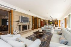 54 Lane Cove Road, Ingleside NSW For Sale - Offers Over $8,500,000 8 9 6 Unequivocally one of Sydney's finest estates, this magnificent 5 acre holding has left nothing undone its quest for luxurious liveability. From its spectacular gala indoor/outdoor entertaining venues including a tennis court, 26 metre heated pool, indoor jumps arena and state-of-the-art stables, it exceeds the expectations of the most discerning elitist on every front. Nestled on private rolling lawns with sweeping 180 degree north easterly ocean and coastal vistas, it is only 30 minutes from the CBD and moments to village shops, schools and beaches. Drive through the secure gated entry and wind your way past the timber post, rail paddocks and cascading waterfall to the residence. From the moment you lay eyes on the exquisitely crafted facade it becomes immediately apparent that this residence is of the highest calibre. Exquisitely crafted from sandstone and wrapped in a timber posted bull-nose verandah with a large turret romancing the facade, it tastefully fuses Australian colonial and European provincial themes with designer finishes to create a retreat of elegance and sophistication with a warm country-style ambiance. Guests are welcomed through the grand formal entrance foyer with soaring double height ceilings with an elaborate antique chandelier lighting the way. The living spaces have been cleverly interwoven to integrate with an enormous indoor/outdoor loggia with an open fireplace. Separate living and dining areas merges seamlessly with level lawns and soaks in the north easterly sun, summer breezes and sweeping views. It comes complete with formal living and dining spaces plus an enormous family room or home cinema with surround sound and mounted flat screen TV. Finished in imported Italian marble with a breakfast bar and state-of-the-art European appliances, the kitchen is equipped with a commercial-grade gas stove with barbecue plate and two ovens, two integrated dishwashers and pantry. King sized bedrooms all with built-ins and ensuites. The palatial master forms the heart of circular turret & features towering ceilings, dressing room, wardrobes built into the circular wall & a spiral staircase that leads to a circular mezzanine library with access to the sun drenched terrace with spectacular views. Absolute heaven for the dedicated wine connoisseur, the wine cellar is locked behind iron gates and consists of a labyrinth of sandstone walled rooms with cedar wine racks holding up to 4,000 bottles.
