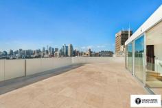 Unit 1501/507 Wattle Street, Sydney NSW For Sale - $3,300,000 3 4 4 For the first time offered since completion, Vanguarde is happy to present to you this spectacular brand new three bedroom penthouse, which is ideal for the modern family or foreign purchaser. Commanding the top 2 levels, this impressive residence offers a huge roof top terrace with uninterrupted 180 degree north, views of Sydney. Spanning from the west right around to the east, this aspect incorporates stunning city skyline and Anzac Bridge views. Accommodation comprises of 3 generous bedrooms, all with full ensuites including spa bath, and built in robes. This residence offers a total of 545sqm on title. The huge rooftop terrace includes a full outdoor kitchen with BBQ plus a complete guest bathroom. With direct lift access from the ground, making it perfect for entertaining guests! Features include only the highest quality finishes throughout, including marble stone and Australian hardwood timber flooring, LED lights and double glazed floor to ceiling glass, allowing you to take in the expansive views. The designer kitchen comes complete with White Caesar stone bench tops, stainless steel Smeg appliances including built in coffee machine and plate warmer, soft close drawers and a built in double door fridge. The residence provides ducted reverse cycle air-conditioning, spacious 4 car lock up garage with direct lift access plus extra storage, an internal laundry and a self controlled video security system. With the lowest strata levies in Sydney for a property of this size, and the possibility to extend space and add value, the opportunities in purchasing this property are endless. This is truly a unique property and is must see for anyone looking at purchasing their perfect city home! Quarterly Rates Strata: $805 per quarter approx Water: $168 per quarter approx Council: $225 per quarter approx For more information contact Travis Reeve on 0414 347 713 or travis@vanguarde.com.au or Darren Smith on 0412 418 415
