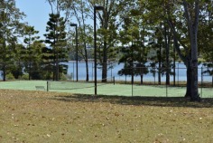Bimbadeen means place of waterbirds - a waterfront acres sanctuary with 300 degree lake views, fishing, boating, sailing, flying??? Frontage to beautiful Lake Macdonald overlooking Noosa's botanical gardens. Private driveway is boarded by water on either side, with exotic wildlife and magnificent views to Mt Cooroy & Tinbeerwah. The perfect combination of being only 5 minutes from Cooroy and 15 minutes to Noosa, with town water, sewer and peace and tranquility. Sprawling brick residence with raked ceilings, french oak floors, gourmet kitchen, gas & induction cooking and ducted air conditioning. Solid timber doors & windows throughout. 3 separate living areas, wide entertaining patios, 4 car garage and boat store/cellar under the home.
500m Bitumen airstrip, fully insulated 2 plane hangar with workshop, separate machinery shed and van port.
Stroll the park like acreage on this resort style sanctuary tailored for relaxation. Host a tennis party on your own flood lit tennis court. This property is your opportunity to live the dream, own or operate an aircraft, also ideal for car or boat enthusiast with 2 large quality sheds and 3 phase power.18.29 acres/7.4 hectares. For further details or inspection please contact our office. rh06506
Bimbadeen - 18.29 acressealed airstrip2km Lake Frontplane hangar and shedstotally private