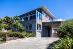 2 Eastview Terrace, Jan Juc VIC Enjoy the Eastview Lifestyle! If you are seeking out a home in Jan Juc it stands to reason that you are drawn to the water, what better way to fulfill that need than with a view of the ocean to wake up to every morning. Situated in one of the quieter pockets of a relaxed coastal village, this property in Eastview Terrace takes full advantage of its position which is in easy walking distance to the beach, golf club and shops ensuring you enjoy the landscape and local lifestyle. Contemporary in design, the double story home makes the most of an easy care block of land by maximising both living and outdoor space. Inside, four generous bedrooms on the ground floor are serviced by both a modern family bathroom and ensuite to the master with all except the fourth bedroom enjoying the benefit of WIRs. Providing direct access to the gardens (complete with large garage, double carport and secure parking for boat/caravan), a large second living area on this level provides flexibility and a perfect retreat for the younger members of the family. The upper level is dedicated to everyday living with a bright, spacious kitchen flowing through the dining and family rooms (beyond the handy powder room) onto a well_positioned balcony that offers sweeping, panoramic views over the ocean. Clever design elements, such as the north facing highlight windows, flood the room with natural light giving further depth to the richness of polished timber floorboards whilst, the morning sun through the expanse of windows opening to the balcony invite lazy breakfasts with a paper and the reminder that you do indeed, live by the beach. The simplicity of good quality, well maintained fixtures and neutral tones makes this a comfortable, functional and laid_back home to live in. It is a welcoming home that offers families an opportunity to live their coastal dream without fuss but with a real emphasis on capturing the desire and making it real!