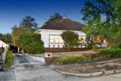 DEEPDENE 17 Chatfield Avenue FOR SALE LIVE THE DREAM on the Reid Estate. This classic solid brick well proportioned family home on 904sqms is in a magnificent location. The entrance is a statement of bevelled glass doors, gorgeous understated leadlight windows and silky oak hall paneling. Original beautifully patterned carpet covers hardwood floors across 4 generous bedrooms and a study area. The adequate 70's kitchen and tiled bathroom are centrally located. And the large formal sitting room and separate dining room, both with fire places spill into the sunroom overlooking the private north facing garden with a magnificent magnolia tree. Ideally located in the quiet and much sought after locale near Camberwell Grammar, city tram and lush parklands, cycle tracks and walking trails. LAND: 20m x 45m (900sqm approx) = 65ft x147ft (9,555sqft approx) - 60 days to 8 months settlement available.A great opportunity to move in now and update later. INSPECT BY APPOINTMENT