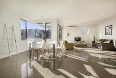 25 Tanti Avenue Mornington VIC 3931 Seaside Living Enjoy seaside living at it's best in this stellar combination of high-end product and a functional floor plan. Meticulously designed to embrace comfort and style, this townhouse offers polished porcelain tiles and 100% wool carpets accenting the architecturally designed features. Fitted to international standards, the entertainers kitchen features Smeg appliances highlighted with Ceasar stone bench tops, while functional bathrooms are dressed in fine porcelain tiles and an abundance of well-appointed fittings. Full inclusions lists available on request.