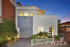 254 Montague Street, South Melbourne VICBIGGEST IN THE DISTRICT One of South Melbourne's most premier and deceptive homes, this Mills Gorman designed property sitting on approx 270sqm offers impressive proportions, outstanding accommodation plus a coveted inner city lifestyle opportunity. Comprising: Spacious hallway entrance, front study, generous separate laundry, two excellent bedrooms (with built-in robes), marble central bathroom and family room/teenager's retreat leading to an impressive landscaped outdoor deck with right of way access. Upstairs Comprising: Exceptional main bedroom (with stunning ensuite, walk-in robe plus additional cupboard space), modern chef's kitchen, adjacent dining and expansive sun filled living area (with gas fireplace and plantation shutters) leading to wrap around north facing terrace providing a delightful tree-lined aspect. Features: Huge lock up garage with additional storage, split system heating/cooling and slab heating downstairs. Moments to St Vincent Place Gardens, South Melbourne market and Albert Park Village. Inspect during scheduled open times or by appointment with the agent. For further information, please visit http://254montaguestreetsouthmelbourne.com Presented by Cayzer Real Estate Albert Park & Port Melbourne. ALL ENQUIRIES MUST INCLUDE A PHONE NUMBER.