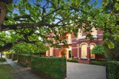 15 Avondale Road, Armadale VIC One of Melbourne’s most beautiful homes in one of Armadale’s most attractive addresses, Avondale Hall (1911) balances classical Queen Anne Revival elegance with a contemporary consciousness that means its illustrious spaces respond beautifully to current day family needs. The romance of the external aesthetics is immediately matched by the stylishness interior proportions including refined, yet user friendly formal sitting and dining rooms, each defined by bay windows and period fireplaces. A light filled family room which faces the northerly rear garden is complemented by separate kitchen and everyday dining areas opening to the evocative rear verandah, lush lawns and solar heated pool. Five inviting upstairs bedrooms, include a majestic main bedroom with double shower ensuite. The four further bedrooms surround a sunny central bathroom. Hydronic heating. Attic and cellar storage. Return drive off street parking. Perfection.