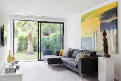 BRIGHTON 1 Laburnum Court AUCTION Saturday 24 May 2014 at 3:00pm An Exhilarating Experience Of Architectural Brilliance A new contemporary masterpiece of absolute luxury designed by architect Martin Friedrich provides a perfect 3 / 4 bedroom residence for any stage of life in a quiet Brighton enclave between the shopping strips of Church and Bay Street and close to all main schools. The design provides the ultimate in indoor-outdoor living with a large spacious living room opening via fully retractable sliding doors to the entertainer's garden designed by Jack Merlo, with built in slim line Electrolux barbecue and glass tiled wrap around pool. The interior of the residence features a magnificent sculptural circular staircase transcending all three levels and also has provision for a lift - structure, power and phone line provided. The chef's kitchen fitted with Pietro Grigio marble, Miele and Liebherr appliances, has superbly detailed cabinetry with walk in butler's pantry. Other areas on the ground floor include a second living room or possible fourth bedroom, home office fitted with built in desk and exquisitely detailed timber cabinets, laundry with built in TV and powder room. On the upper level, three spacious bedrooms enjoy access to ensuite bathrooms, walk-in robes & private balconies. The lower level includes a fully equipped home theatre, gym, wine cellar, storeroom, second powder room and substantial five car basement garage with turntable. Other high end features of this luxurious home include reverse cycle air conditioning, alarm system, intercom, video -monitored entry, double glazed windows, hand selected European Oak flooring, rainwater storage tank, remote controlled blinds with recessed pelmets, ambient gas fire in living room, Niles speakers indoors and out, drip irrigation system, laundry chute from first floor. INSPECT BY APPOINTMENT AT ADVERTISED TIMES.
