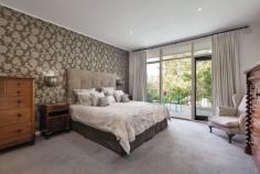 17 Bolton Avenue, Hampton VIC Exclusive Beachside Magnificence For AuctionSaturday May 24, 12:30pm Add to calendar + The finest blend of sophistication and spaciousness is at the heart of this prestige home, metres from the beach and near everything families desire. Renovated and extended with a luxury edge, it works wonderfully for relaxed living and large-scale celebrations. The 5-bedroom and study floorplan, big living spaces, a north-facing garden with a pool and plenty of play space, and many superior features combine perfectly. Inspired design has created the ultimate self-contained games room with home cinema option, a welcoming family room and a dining room with north-facing aspects and open fireplaces, renovated Ilve and stone kitchen with deluxe butler's pantry and outdoor servery, and a laundry with drying room. There's even a temperature-controlled cellar, custom-created to optimally store more than 1,500 bottles of wine next to the state-of-the-art bar. Classic origins and contemporary style are beautifully matched, with hydronic heating, a grand staircase, premium wallpapers, parquet floors, large and luxurious ensuite, and a full-width first-floor terrace. Spectacular from the street, secure and elegant, every aspect of this executive-quality home is impressive. Bolton Avenue is an exclusive Brighton Beach address, sought-after for its proximity to the bay, schools, Hampton St's cafes, and train stations. Make this yours and live the beachside lifestyle you've been yearning for.
