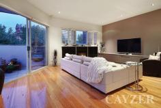 254 Montague Street, South Melbourne VICBIGGEST IN THE DISTRICT One of South Melbourne's most premier and deceptive homes, this Mills Gorman designed property sitting on approx 270sqm offers impressive proportions, outstanding accommodation plus a coveted inner city lifestyle opportunity. Comprising: Spacious hallway entrance, front study, generous separate laundry, two excellent bedrooms (with built-in robes), marble central bathroom and family room/teenager's retreat leading to an impressive landscaped outdoor deck with right of way access. Upstairs Comprising: Exceptional main bedroom (with stunning ensuite, walk-in robe plus additional cupboard space), modern chef's kitchen, adjacent dining and expansive sun filled living area (with gas fireplace and plantation shutters) leading to wrap around north facing terrace providing a delightful tree-lined aspect. Features: Huge lock up garage with additional storage, split system heating/cooling and slab heating downstairs. Moments to St Vincent Place Gardens, South Melbourne market and Albert Park Village. Inspect during scheduled open times or by appointment with the agent. For further information, please visit http://254montaguestreetsouthmelbourne.com Presented by Cayzer Real Estate Albert Park & Port Melbourne. ALL ENQUIRIES MUST INCLUDE A PHONE NUMBER.