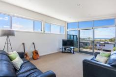 2 Eastview Terrace, Jan Juc VIC Enjoy the Eastview Lifestyle! If you are seeking out a home in Jan Juc it stands to reason that you are drawn to the water, what better way to fulfill that need than with a view of the ocean to wake up to every morning. Situated in one of the quieter pockets of a relaxed coastal village, this property in Eastview Terrace takes full advantage of its position which is in easy walking distance to the beach, golf club and shops ensuring you enjoy the landscape and local lifestyle. Contemporary in design, the double story home makes the most of an easy care block of land by maximising both living and outdoor space. Inside, four generous bedrooms on the ground floor are serviced by both a modern family bathroom and ensuite to the master with all except the fourth bedroom enjoying the benefit of WIRs. Providing direct access to the gardens (complete with large garage, double carport and secure parking for boat/caravan), a large second living area on this level provides flexibility and a perfect retreat for the younger members of the family. The upper level is dedicated to everyday living with a bright, spacious kitchen flowing through the dining and family rooms (beyond the handy powder room) onto a well_positioned balcony that offers sweeping, panoramic views over the ocean. Clever design elements, such as the north facing highlight windows, flood the room with natural light giving further depth to the richness of polished timber floorboards whilst, the morning sun through the expanse of windows opening to the balcony invite lazy breakfasts with a paper and the reminder that you do indeed, live by the beach. The simplicity of good quality, well maintained fixtures and neutral tones makes this a comfortable, functional and laid_back home to live in. It is a welcoming home that offers families an opportunity to live their coastal dream without fuss but with a real emphasis on capturing the desire and making it real!
