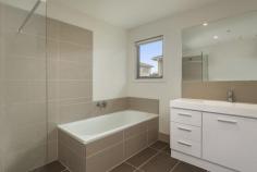 2/881 Doncaster Road, Doncaster East VIC Impeccable & Inviting Presenting the height of style and sophistication, this stunning ground floor apartment sits nestled in a boutique residential complex opposite Jackson Court. Showcasing high quality structure, fixtures and design, and a sleek contemporary aesthetic, it presents a spectacular open floor plan that combines the kitchen, living and dining domain with a private balcony plus 2 bedrooms serviced by 2 bathrooms. Also features: *Polished floorboards; SS appliances *Central bathroom & ensuite; Laundry facilities *Split system heating & air conditioning *Secure basement car park & storage space *Close to buses, schools, parks & sports facilities *Near to Doncaster Park+Ride, Westfield & Eastern Freeway