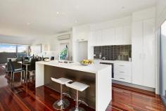 4/ 3 Sturt ESSENDON Bed 3 | Bath 3 | Car 2 Inspection Times Auction Times 12:00pm - 12:30pm Saturday, 17 May 2014 11:00am Saturday, 14 Jun 2014 Alluring Lifestyle In Desirable Locale Revel in the exemplary living style presented by this modern three bedroom residence on 252 sq meters (approx.), situated in a small cul-de-sac adjoining Cliff Allison Reserve, mere moments from trams and the many temptations of North Essendon Village. Zoned for Strathmore College, it showcases a vast living/dining/impressive kitchen and generous entertainers' deck, dominating the top floor of three storeys. The kitchen presents expansive stone surfaces, stainless steel Smeg appliances, including an electric oven and dishwasher, plus a four-plate glass ceramic cooktop, range hood, pantry and cabinets. There are also smaller balconies with views, contributing to the delivery of a highly sought-after, fashionable and easy lifestyle. Enhanced by a video intercom and complete with split system heating/cooling, supplemented by panel heaters on the ground floor, the home boasts three enormous bedrooms (each with a chic ensuite). The master bedroom encompasses a covered balcony, a very spacious walk-in robe and a large, stylish ensuite, complete with a relaxing deep bath, separate shower, toilet and vanity, with two tasteful semi-recessed basins. There is also a convenient powder room, adjoining the living zone, plus a laundry and an electronic tandem garage with direct entry. Serenely situated, yet so convenient to Essendon's best features and the CBD, contentment is calling.