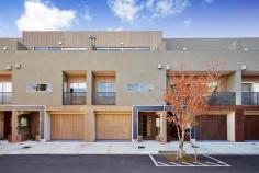 4/ 3 Sturt ESSENDON Bed 3 | Bath 3 | Car 2 Inspection Times Auction Times 12:00pm - 12:30pm Saturday, 17 May 2014 11:00am Saturday, 14 Jun 2014 Alluring Lifestyle In Desirable Locale Revel in the exemplary living style presented by this modern three bedroom residence on 252 sq meters (approx.), situated in a small cul-de-sac adjoining Cliff Allison Reserve, mere moments from trams and the many temptations of North Essendon Village. Zoned for Strathmore College, it showcases a vast living/dining/impressive kitchen and generous entertainers' deck, dominating the top floor of three storeys. The kitchen presents expansive stone surfaces, stainless steel Smeg appliances, including an electric oven and dishwasher, plus a four-plate glass ceramic cooktop, range hood, pantry and cabinets. There are also smaller balconies with views, contributing to the delivery of a highly sought-after, fashionable and easy lifestyle. Enhanced by a video intercom and complete with split system heating/cooling, supplemented by panel heaters on the ground floor, the home boasts three enormous bedrooms (each with a chic ensuite). The master bedroom encompasses a covered balcony, a very spacious walk-in robe and a large, stylish ensuite, complete with a relaxing deep bath, separate shower, toilet and vanity, with two tasteful semi-recessed basins. There is also a convenient powder room, adjoining the living zone, plus a laundry and an electronic tandem garage with direct entry. Serenely situated, yet so convenient to Essendon's best features and the CBD, contentment is calling.