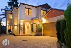 5A Pangbourne Street, Wembley WA LARGE 2 storey home with all the PRIVACY & SECURITY you could ever want! WHY YOU SHOULD BUY ME: - 5 huge bedrooms with ground floor King sized master - 2 luxury bathrooms, ensuite with corner spa - Professionally equipped home theatre & open plan kitchen, family, meals - Triple remote garage with access to rear - Gourmet kitchen with SMEG & Miele appliances - Blackbutt timber flooring - Low maintenance easy care block with North facing outdoor entertaining - Ducted reverse cycle Air Conditioning - Secure lock & leave design - Awesome location close to everything GENERAL - Alarm with security camera, Auto-retic, Insulation, Ducted vacuum, Caesar Stone bench tops, Surround sound to family and outdoor area, His & Her's robes, High ceilings, 25sqm Attic storage with drop down stairs, External electronic weather awning, 2 x water features, front and rear garden lighting, smart wiring. WHAT MY OWNERS SAY ABOUT ME: Low maintenance and spacious this really has been our dream home! It's in such a fantastic location and close to the freeway. It's surrounded by quality houses & people. Very easy lock & leave roomy house. DISTANCE TO: 242m to Cambridge St shopping precinct 1.48kms to Subiaco 4.45kms to Perth CBD 5.41kms to City Beach BUILT - 2004 TOTAL LIVING - 315.67sqm (approx.) BLOCK SIZE - 584sqm COUNCIL RATES - $2431.33 p/a approx. WATER RATES - $1199.00 p/a approx.