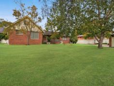 24 Robert Street, Tenambit NSW EXCEPTIONAL, SIZEABLE, AVAILABLE!! This spacious family residence is an absolute must for the larger family to inspect ASAP! Seeing is definitely believing and with its 6 bedrooms, 3 bathrooms, formal lounge and dining AND rumpus area, you will go a long way to find bigger. Not only will the size impress, the home has been quality built with 9 ft ceilings throughout, terracotta tiled roofing and superior bedroom sizes available. A separate study is also present. This huge home is set on an amazing 1200 sqm allotment also, with excellent side access and a park like backyard which like the residence, is massive in size. It is rare that a home of this calibre enters our market place and when they do, you can be assured of plenty of competition. Move the odds into your favour, call today and inspect before the weekend open home, it's yours for the taking!! Property Snapshot Property Type: House Construction: Brick Features: Alarm Built-In-Robes Close to schools Close to Transport Dining Room Dishwasher Ducted Heating Ensuite Established Gardens Family Room Fenced Back Yard Formal Dining Room Gas Landscaped Gardens Lounge Powder Room Rumpus Room Storage Study Teenager Retreat Verandah Walk-In-Robes Workshop