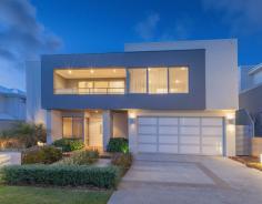 86 Shipmaster Avenue, Alkimos WA CONTEMPORARY CLASS! ALKIMOS Date Available: NOW For Sale: From $769,000 Stunning crisp clean lines pervade this ex-display family home that is packed full of design features for everyone to enjoy. Enviably situated in the magnificent Shorehaven Estate just 20 minutes north of Joondalup, you will be immersed by other quality residences that share the complete Alkimos experience. Features include, but are not limited to: - 4 bedrooms, 2 bathrooms - A light-filled open lounge and dining area is overlooked by a galley kitchen with only the finest in quality integrated appliances, glass splashbacks, a walk-in pantry and sleek cabinetry - The kitchen itself is highlighted by sparkling stone bench tops, a double sink, a breakfast bar for meals and stunning Bosch appliances (including a gas cook top, two separate ovens, a coffee machine, microwave and dishwasher) - The main living area leads into an alfresco (with power) for easy-care entertaining and a real indoor-outdoor integration - A separate gazebo deck doubles outdoor entertaining options with room for a future external kitchen overlooking a tranquil courtyard area with seating - There is a home theatre room with double doors on the ground floor as well as a separate study or activity area to appease for everybody’s personal needs - A downstairs sleeping wing includes three carpeted bedrooms with built-in wardrobes, a bathroom with a separate bath and shower, a separate powder area, WC and a quality laundry with tiled splashbacks, built-in storage and outdoor access - The entire upper level doubles as a parent’s retreat with a sitting room, ocean views from the balcony and a delightful master bedroom suite with a fitted walk-in robe and a fully-tiled stylish ensuite with a huge rain shower, twin vanities and a toilet - A slice of the sea views from within the master ensemble - Double remote lock-up garage with internal shopper’s entry - Recessed ceilings and a gas bayonet to main living zone - Under-stair storage - Stunning facade with a decked entrance - Beautifully manicured gardens and artificial rear lawns – very low-maintenance - Ducted and zoned reverse-cycle air-conditioning - Feature down lighting - Security alarm system (plus CCTV) - Venetian blinds throughout - Energy-efficient gas hot water system with heat pump - A boutique modern design with an endless list of top-class features - Built by Lorimer Homes/Home Group WA, “The Haven” has a total living area of 343sqm - 528sqm block (approx.) - Very close to the beach - Easily accessible to amenities - Move straight in! General Features Property Type: House Bedrooms: 4 Bathrooms: 2 Garage Spaces: 2