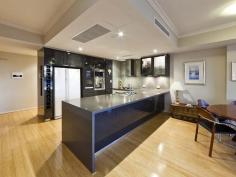 20/880 Canning Highway, APPLECROSS WA FIRST HOME OPEN SAT 2:00 - 2:40pm. What is your life priority? Security? Lock n Leave? Peace? Your own space? From the wide and elegant entry foyer, all the way up to the expansive balcony views and impressive interior finishes, there is a lot to love with this Applecross apartment. The security tab activated lift heads up to the front door - and with only two apartments on the level, privacy is guaranteed. Walk into the entry hallway - lined with stylish bamboo flooring (cushioned for sound proofing) and take in the views and the sunshine all in one go, thanks to large floor-to-ceiling window. The custom-made patterned vertical blinds complete the look. The kitchen cleverly incorporates plenty of handy and concealed storage options - including a series of cupboards neatly tucked away as part of the breakfast bar. Stone benchtops with a waterfall edge offer a sophisticated look while the combination of Miele and Smeg appliances, room for a double fridge and an extra-wide oven is sure to please casual cooks as well as serious entertainers. Sliding doors lead out to the partially enclosed balcony, offering views of leafy Applecross and river glimpses and uninterrupted city views. Automated blinds are a clever inclusion and are controlled by the sun, so while you are at work or play, your environment is protected. Inside, zoned Fujitsu reverse-cycle air-conditioning is also on offer. The master suite includes two mirrored, sliding robes - both of which have fitted out beautifully with plenty of hanging and storage space, as well as access to the luxury ensuite, featuring a large shower, spa bath and full height tiling. Two additional bedrooms offer stunning river views and balcony access. With resort style facilities available on the ground level - including a pool, spa and gym, as well as undercover parking for two cars and a private storage area, everything is at your fingertips.