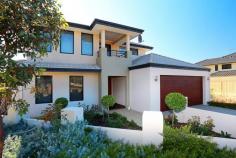 28 Samphire Turn, BEELIAR WA With 4 Bedrooms, 2 Bathrooms and a huge list of features, this 2-Storey home built by In-vogue is truly in a class of its own. Inside the home there is solid wood flooring throughout, ducted rev/cycle air-conditioning, an oversized garage with shopper's entry, an alarm system, upstairs kitchenette and also ocean and city views from the top level. Out the back you will find a dream alfresco area with wooden decking and an outdoor kitchen with stone benchtops. All of this is directly opposite manicured parkland and there is reticulation both front and back. This quality home is going to be in high demand, so act fast and call Paul today! Property Features: - 4 Bedroom 2 Bathroom - In-Vogue 2-Storey - 430sqm Block - Ducted Reverse Cycle Air-Conditioning - Outdoor Kitchen - Decked Alfresco - Ocean & City Views - Directly Across From Manicured Parkland - Upstairs Kitchenette