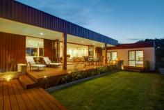 376 Dundas Street, Rye VIC Auction Sat 16 August 2014 11:00 AM $750,000 plus Inspection times: Wednesday 23 July 2014 5:00 to 5:30 PM or Saturday 26 July 2014 11:00 to 11:30 AM When we asked our vendors what they loved about living in this home they said “It is the perfect entertainer, a great place to live and rejuvenate”. But to us, this superb private home is much more. It is unique. The house has a relaxed earthy feel complimented by beautiful natural textures of stone and timber. It is a short walk to secluded surf beaches, the convenient local shops and transport. The lifestyle is the best the Peninsula has to offer. The 5 bedroom limestone home features keyless entry opening to a cleverly designed floor plan , gorgeous Sydney Blue Gum floors, an internal Pyrenees sandstone feature wall, ducted heating and an open fireplace which provides ambiance and warmth. The kitchen, in the same natural tones, has Caesar Stone bench tops, a 90cm stainless steel gas stove and all the mod cons one dreams of. The main living area, centrally located between the two bedroom wings, is huge allowing access to the main entertaining deck designed to take full advantage of the north facing aspect of the house. Add to this, easy to maintain irrigated landscaped gardens and views to Arthur’s Seat. And the holiday rental income : around $4,900 pw!!!