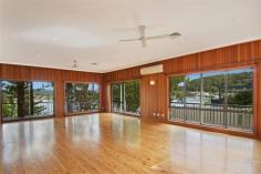 1 Empire Bay Dr Daleys Point NSW 2257 Set on a 1631sqm absolute waterfront block of land this full brick house is a must to inspect for all waterfront buyers. Offering commanding views across St Huberts Island and Brisbane Waters this split level house will accommodate the largest of families. Features include 5 bedrooms, three brand new bathrooms, new oversized kitchen with amazing views, an indoor pool + 2nd living area/rumpus room to the main house + a self contained studio flat you can see that space is no problem here. The block of land also offers a boat house, deep water jetty, sandy beach and a double carport parking + space for several more cars. Full brick construction and set in one of the central coast best suburbs be quick and secure the deep waterfront buy of the year.