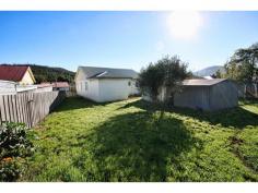 67 Bligh Street Warrane Tas 7018 This fantastic home is located just two blocks from Rosny Park services including Eastlands Shopping Centre and is close to schools and transport. The Kitchen is open to the dining, and there are ample cupboards and bench space. The separate lounge room is generous in size, light, bright, and sunny with a very efficient wood heater. There are four bedrooms, three of the bedrooms being a good size with the fourth being a walk through idea for a nursery or office. Outside there are low maintenance gardens which offer gated access to the large rear yard for parking, plus there is excellent storage options in the garden sheds. This is an ideal investment ready for you to move in or renovate and reap the rewards.
