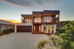 376 Dundas Street, Rye VIC Auction Sat 16 August 2014 11:00 AM $750,000 plus Inspection times: Wednesday 23 July 2014 5:00 to 5:30 PM or Saturday 26 July 2014 11:00 to 11:30 AM When we asked our vendors what they loved about living in this home they said “It is the perfect entertainer, a great place to live and rejuvenate”. But to us, this superb private home is much more. It is unique. The house has a relaxed earthy feel complimented by beautiful natural textures of stone and timber. It is a short walk to secluded surf beaches, the convenient local shops and transport. The lifestyle is the best the Peninsula has to offer. The 5 bedroom limestone home features keyless entry opening to a cleverly designed floor plan , gorgeous Sydney Blue Gum floors, an internal Pyrenees sandstone feature wall, ducted heating and an open fireplace which provides ambiance and warmth. The kitchen, in the same natural tones, has Caesar Stone bench tops, a 90cm stainless steel gas stove and all the mod cons one dreams of. The main living area, centrally located between the two bedroom wings, is huge allowing access to the main entertaining deck designed to take full advantage of the north facing aspect of the house. Add to this, easy to maintain irrigated landscaped gardens and views to Arthur’s Seat. And the holiday rental income : around $4,900 pw!!!