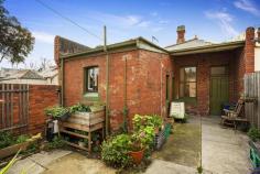 937 Rathdowne Street Carlton North Vic 3054 On one of Melbourne's most beloved tree lined boulevards, Rathleigh's larger than most period proportions, 183sqm (approx.) corner parcel, deep northern frontage and rear laneway offer irresistible scope for brilliant transformation from comfortable three bedroom home to cutting edge contemporary creation! At the end of an enchanting row of six other Victorians, light filled proportions retain their enchanting original charisma with multiple open fireplaces and high traditional ceilings. Stylishly update, perhaps reinstate the early facade or renovate entirely (STCA), fusing modern form and function with traditional class merely a short walk from Rathdowne Village. Features functional kitchen with gas cooking, modernised bathroom, rear courtyard.