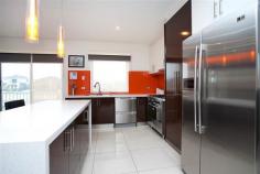 10/5-9 Strathvea Lane Caroline Springs VIC 3023 Designed & created to superb standards. This three level townhouse drenched in natural light with quality fixtures will certainly impress from the moment you enter. Comprising of three bedrooms (master with ensuite and WIR) Spacious living area with study, Gorgeous Bathroom, Stylish kitchen with granite bench tops and stainless steel appliances, generous meals area, euro laundry & low maintenance backyard with pergola. Other features include. - Polished Hardwood Timber floors. - Three Split Systems. - Double garage on remote control. - Timber decking. - Down lights throughout the home.