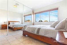 54 Sturdee Street Wentworthville NSW Spacious Family Home In A Privileged Position Prepare to be impressed with this stunning two level five bedroom brick veneer family home. Perched high on the hill in one of Wentworthville's best cul-de-sacs and offering various living areas, stunning views and only moments to schools, railway station and shopping centre. This home is ideal for the extended family or possibly two families. -5 bedrooms -3 living areas -Formal and informal dining areas -2 stunning bathrooms plus a 3rd guest toilet -Open plan kitchen with breakfast bar -Balconies with fabulous views -Undercover outdoor entertaining areas -Electric lock-up garage -Multiple off-street parking -Ducted air conditioning -Security alarm -599m2 block